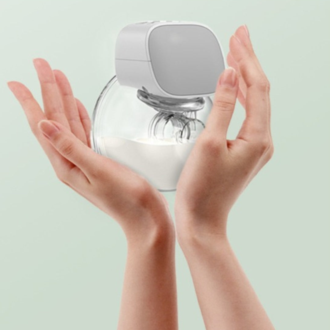 tire-lait-main-libre-mains