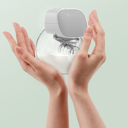 tire-lait-main-libre-mains